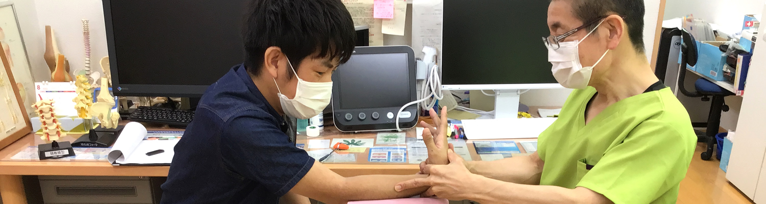 尾下佳史先生の診療風景の写真